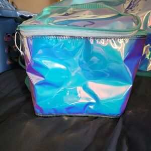 Irradescent travel bag with smaller bag